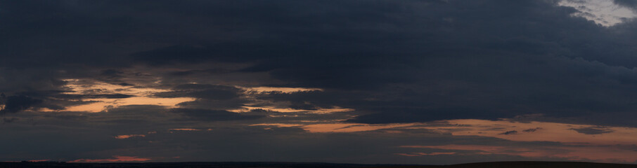 Fototapeta premium Blackout. Tragic gloomy sky. Landscape with bloody sunset. Fantastic skies on the planet earth. Twilight, nightfall.