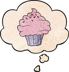 cartoon cupcake with thought bubble in grunge texture style