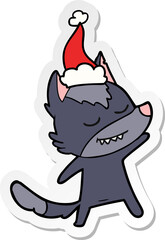 friendly hand drawn sticker cartoon of a wolf wearing santa hat