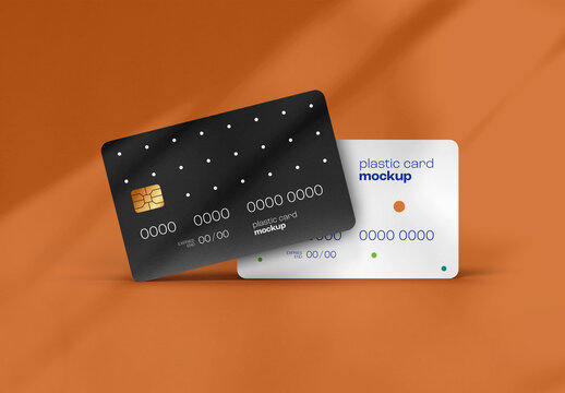 Minimalist Bank Cards Mockup &ndash; Black and White Deposit Plastic Cards on Elegant Orange Background &ndash; Ideal for Banking, Financial Branding, and Secure Payment Promotions