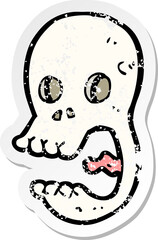 retro distressed sticker of a funny cartoon skull