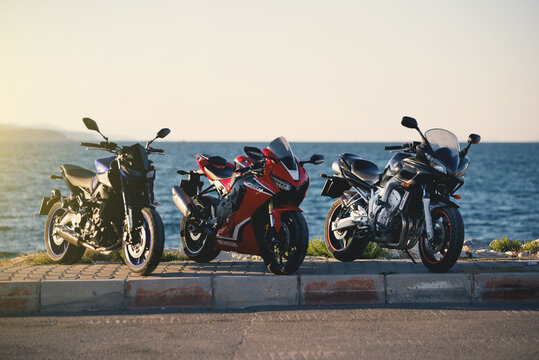Izmir, Turkey. 25 September, 2022. Group of motorcycles parked near by the sea, blue colored Yamaha brand MT09 and FZ600 and Honda CBR1000RR.