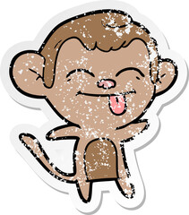 distressed sticker of a funny cartoon monkey