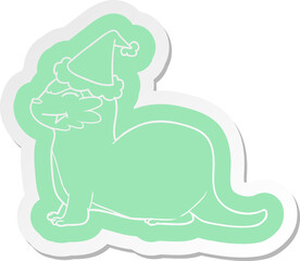 laughing otter quirky cartoon  sticker of a wearing santa hat