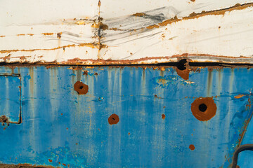 War in Ukraine. 2022 Russian invasion of Ukraine. Damaged bus after shelling (close-up). Terror of...