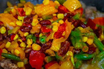 Tasty grilled vegetables on pan on dark background