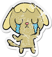 distressed sticker of a cute cartoon dog crying