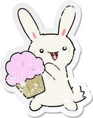 distressed sticker of a cute cartoon rabbit with muffin