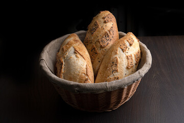 Homemade fresh bread on a dark background