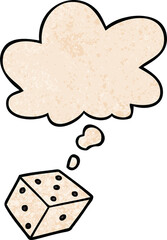 cartoon dice with thought bubble in grunge texture style