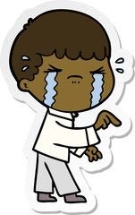 sticker of a cartoon man crying