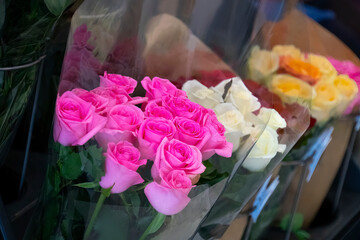 Blur background with roses bouquet in flower shop