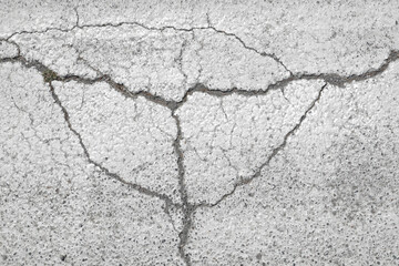 White painted cracked asphalt texture, rough structure and surface, dirty street or floor, no person