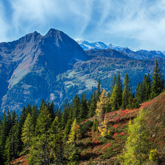 Obraz premium Peaceful autumn Alps mountain sunny view from hiking path from Dorfgastein to Paarseen lakes, Land Salzburg, Austria.