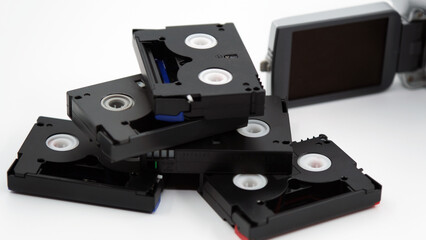 mini dv camera and cassettes, minidv tapes on the white background
