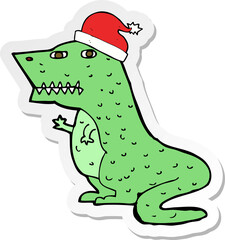 sticker of a cartoon dinosaur in christmas hat
