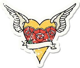 distressed sticker tattoo in traditional style of a flying heart with flowers and banner