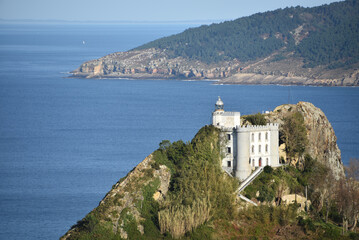 The Faro de la Plata Llighthouse and Cantabrian Sea. Monte Ulia, Pasaia, Gipuzkoa, Basque country,...