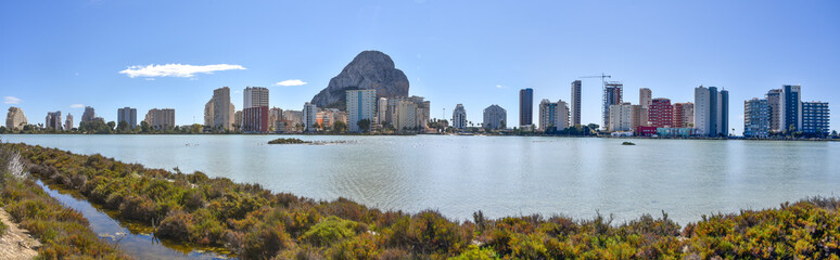 The rock of Ifach, seen from the Las Salines salt lake in Calpe, Alicante, Spain - obrazy, fototapety, plakaty