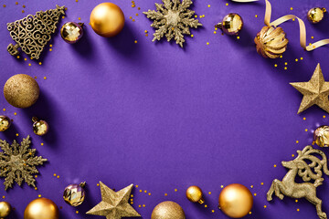 Christmas frame. Golden Xmas decorations on purple background. Luxury Christmas card design, New Year cover template.