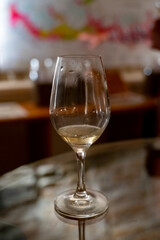 Wine tasting in underground cellars caves of French wine domain in Puligny-Motrachet village, Burgundy, France