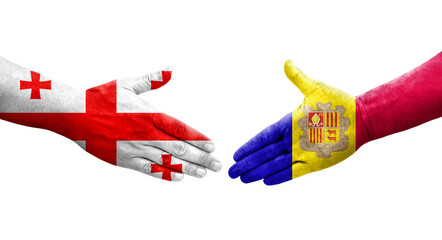 Handshake between Andorra and Georgia flags painted on hands, isolated transparent image.