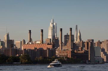 East River view of skyline and power plant in NYC