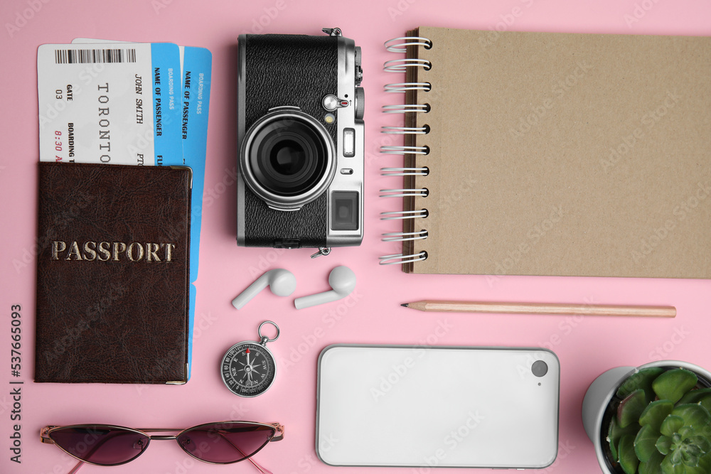 Canvas Prints Flat lay composition with passport, tickets and travel items on pink background