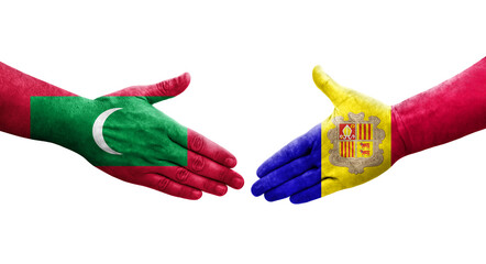 Handshake between Andorra and Maldives flags painted on hands, isolated transparent image.