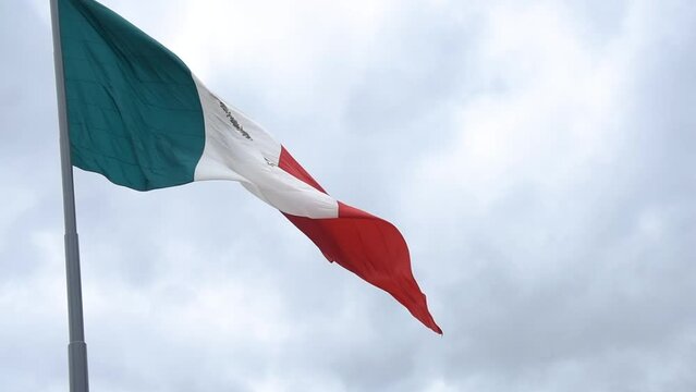 Mexican flag waving with cloudy sky and in Mexico City  - Flag Waving, Mexico Flag