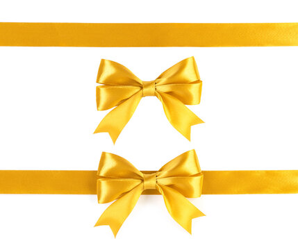 Gold ribbons with bow isolated on white background