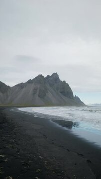 Vestrahorn at Stokksnes Black Sand Beach in Iceland Vertical Video