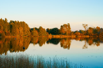 Autumn color of Williamstown lake at sunset Lakeville New Brunswick Canada