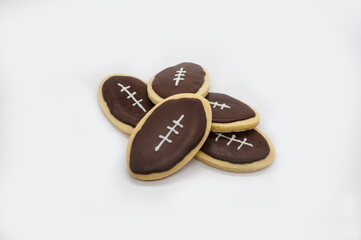 Obraz na płótnie Canvas American super bowl party cookies. Football shape cookies. Home made cookies concept.