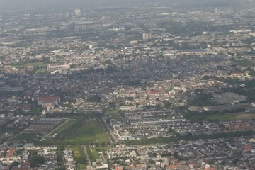 The view from the airplane window. summer day airplane flying over sky view and airplane wings. the deep blue sky and clouds from the plane