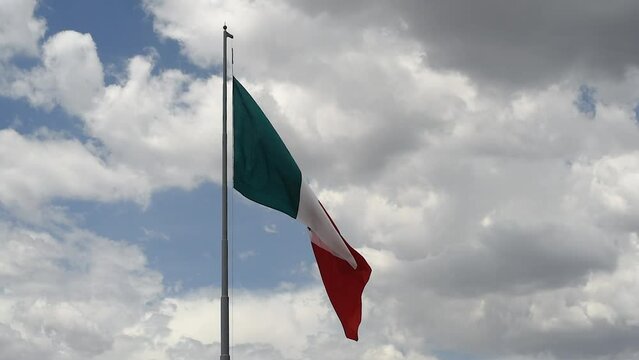 Mexican flag waving with blue sky and clouds in Mexico City - Flag Waving