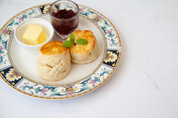 Butter scone set with raspberry and clotted cream