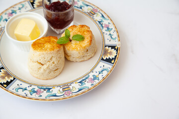 Butter scone set with raspberry and clotted cream