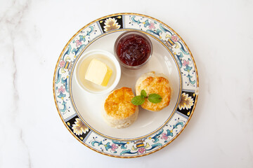 Butter scone set with raspberry and clotted cream
