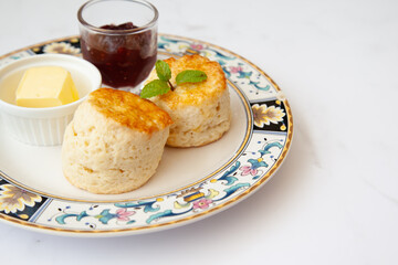 Butter scone set with raspberry and clotted cream