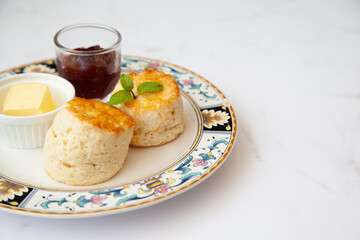 Butter scone set with raspberry and clotted cream