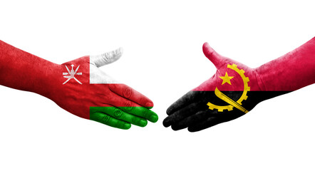 Handshake between Angola and Oman flags painted on hands, isolated transparent image.