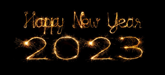 Fototapeta na wymiar 2023 happy new year fireworks celebration written sparkling at night.
