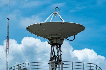 satellite dish with cloud and blue sky