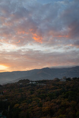 Autumn and sunset in the mountains above Yalta. Vertical photo.
