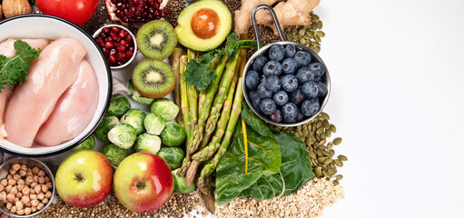 ..Healthy food background. Fresh vegetables, fruits and chicken meat.