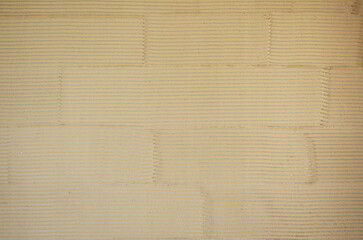 Fototapeta premium Sand mud wall texture of a Japanese traditional townhouse. Japanese style background of 