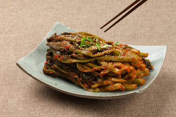 
Kimchi made with mustard leaves and stems.
