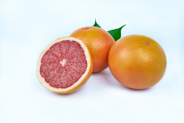 Grapefruit close-up on a white background. A juicy slice of grapefruit.       