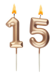 Gold birthday candles isolated on white background, number 15